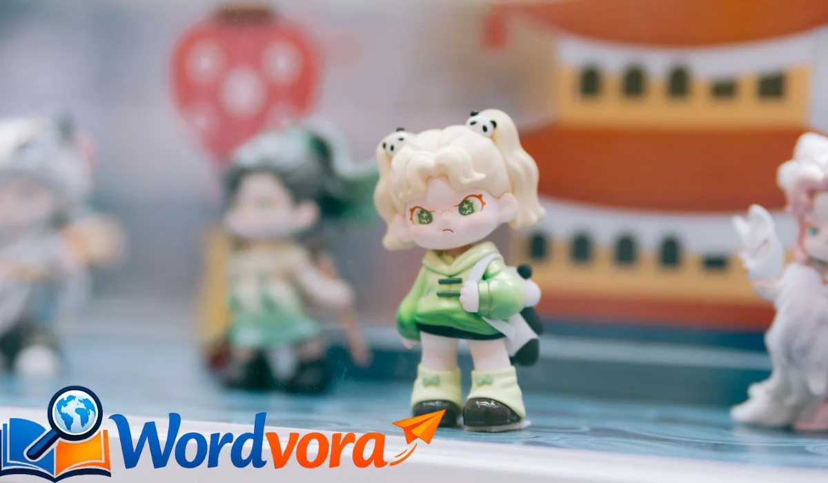 A collectible figurine featuring an oversized head connected by a spring