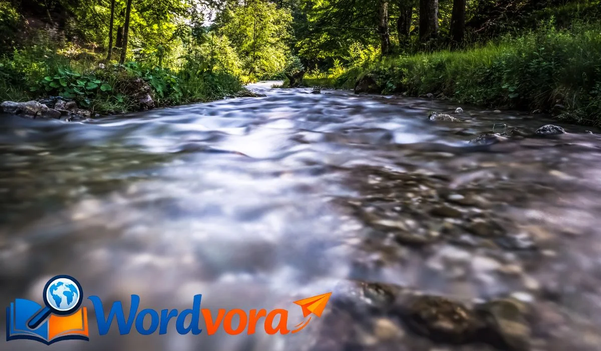 Moving smoothly and continuously in a stream or graceful folds.